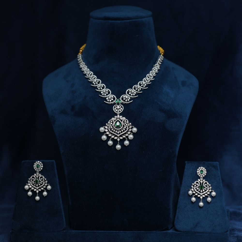 925 silver CZ cubic zirconia Emeralds and Pearls studded Necklace Online Elevate your regal style with timeless jewellery designs from us