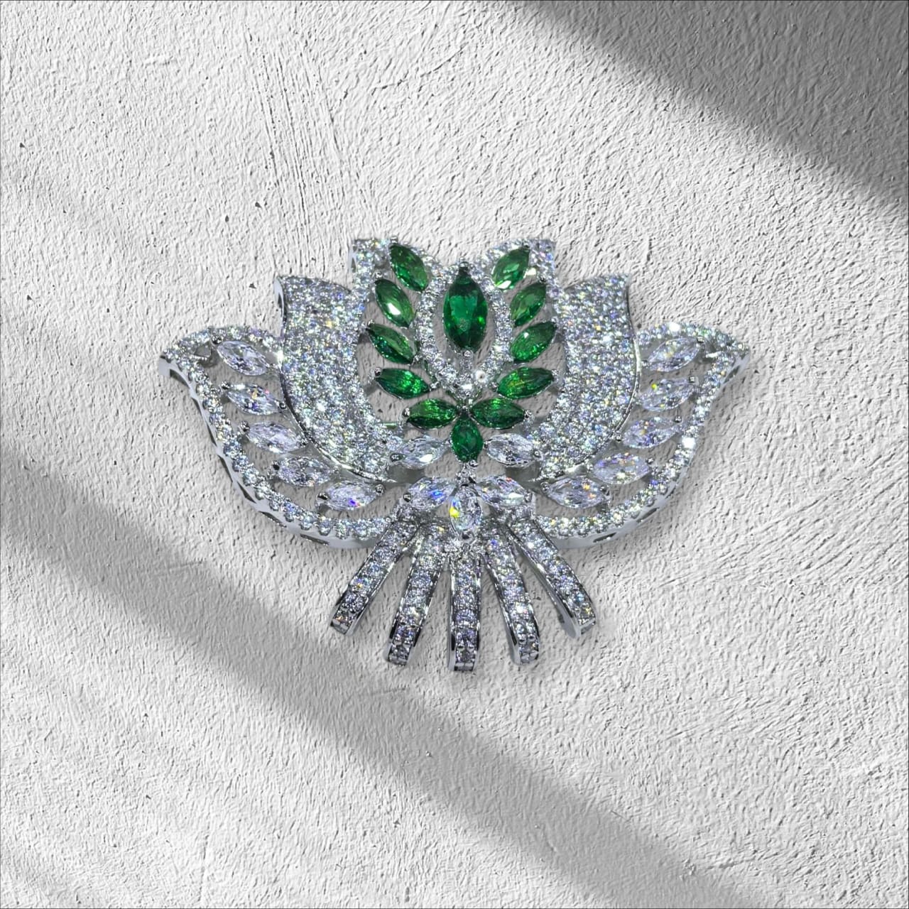 The Emerald-Tone Floral Bouquet CZ Brooch made of 925 silver