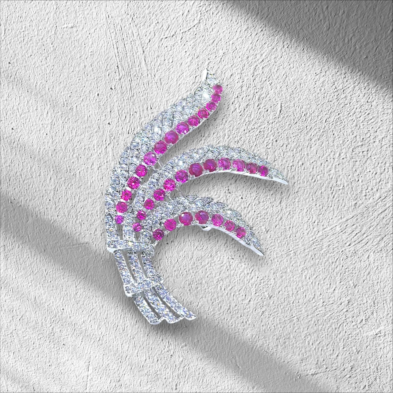 The Phoenix Wing 925 silver Brooch studded with red and white CZ stone